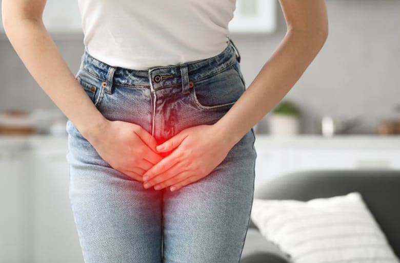 Woman Suffering from Cystitis for the article From Discomfort to Diagnosis Telehealth for UTIs