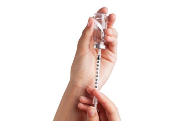 Photo of a vial and syringe