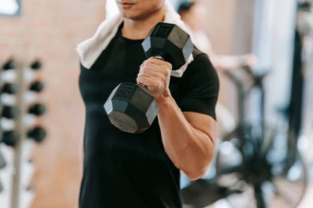 Person working out with dumbbells