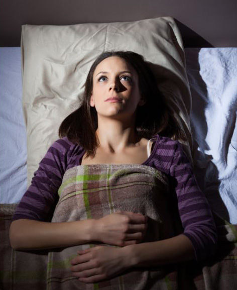 A person unable to sleep