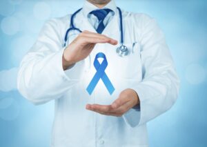Medical Professional presenting a prostate cancer awareness ribbon