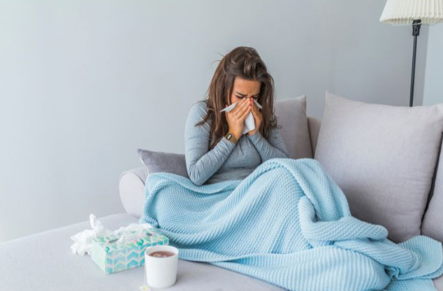 Woman with common cold