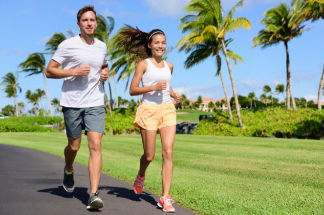 A man and a woman jogging